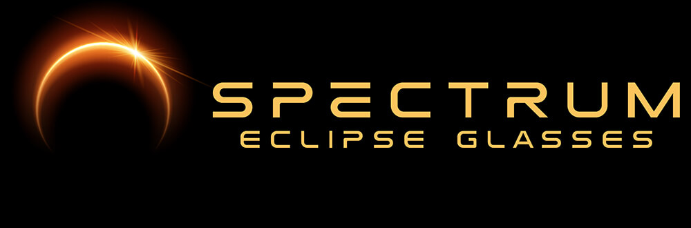 Spectrum Eclipse Glasses logo with golden solar eclipse and text on black background