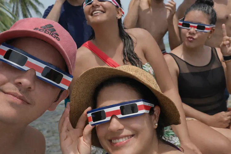 Group in Costa Rica watching a solar eclipse with certified Spectrum Eclipse Glasses